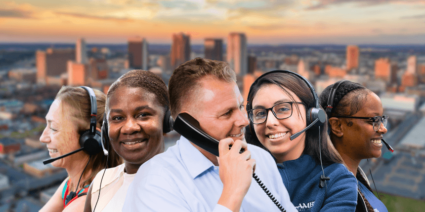 birmingham alabama skyline with ambs call center agents in front