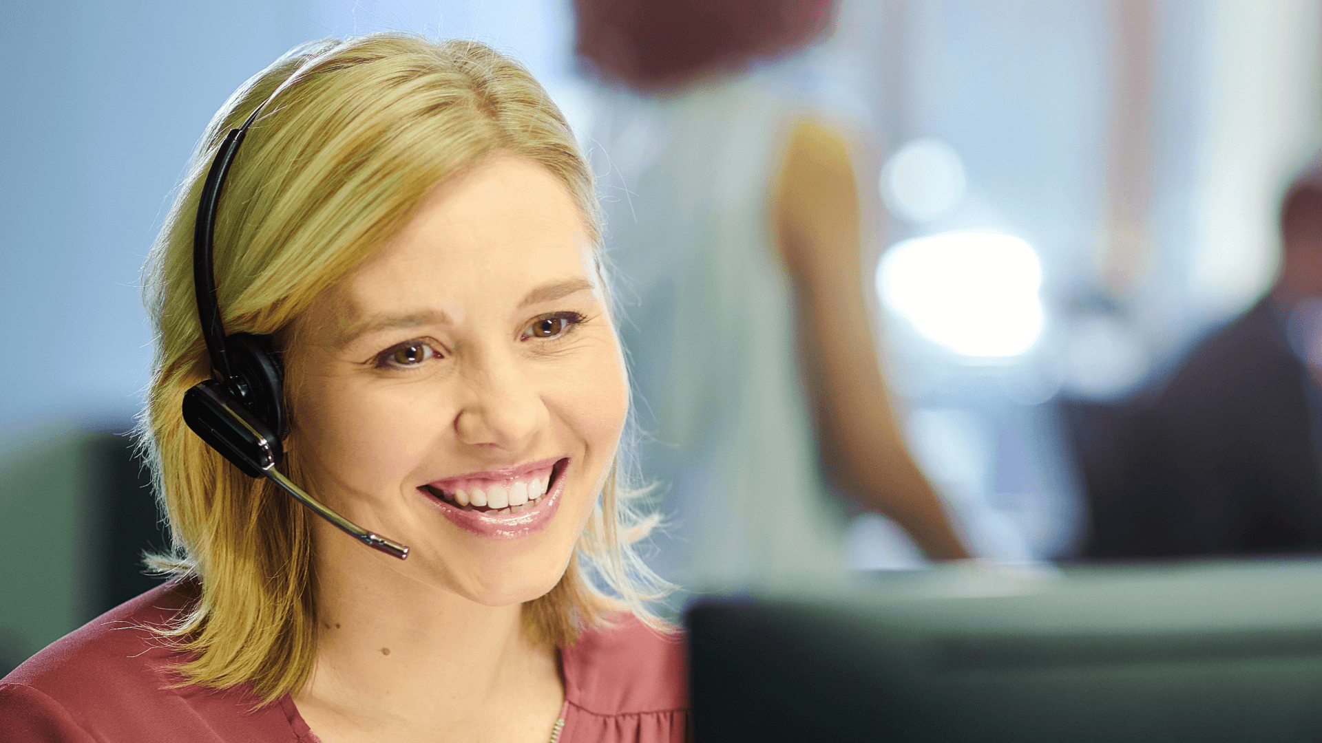 Call Center Female Agent Looking at Computer Screen