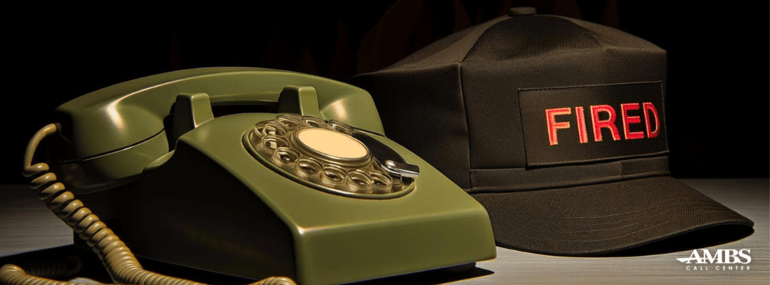 Phone ringing in an answering service with a hat next to it that says fired